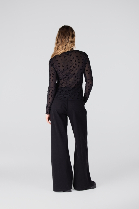 Juffrouw Jansen zwarte dames top | Model achteraanzicht