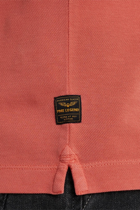 PME legend oranje heren polo | Close up