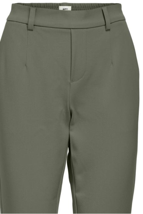 Object groene dames broek | Close up