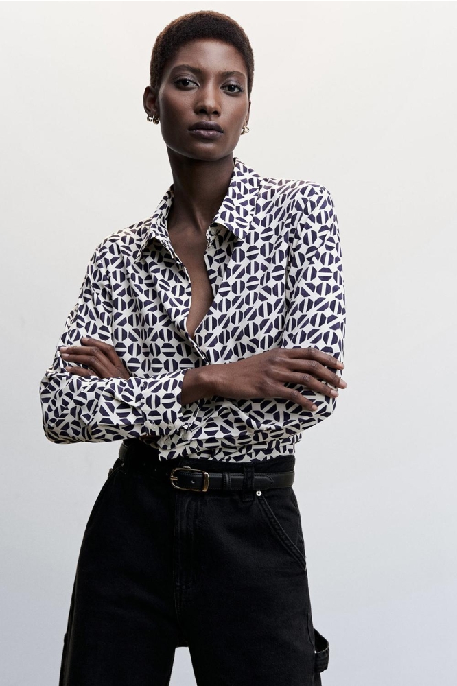SOEPELVALLENDE BLOUSE MET KNOPEN 47050426 57